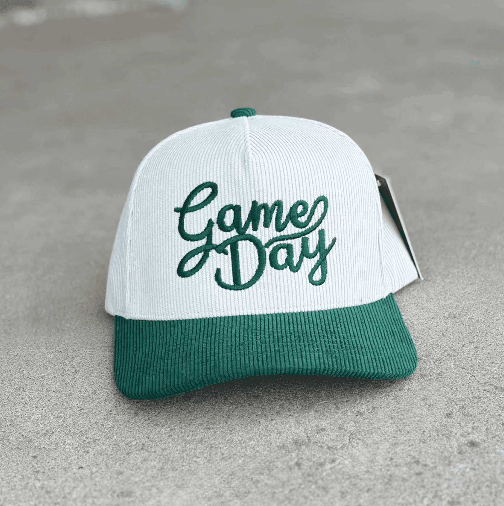 White and green "Game Day" cap.