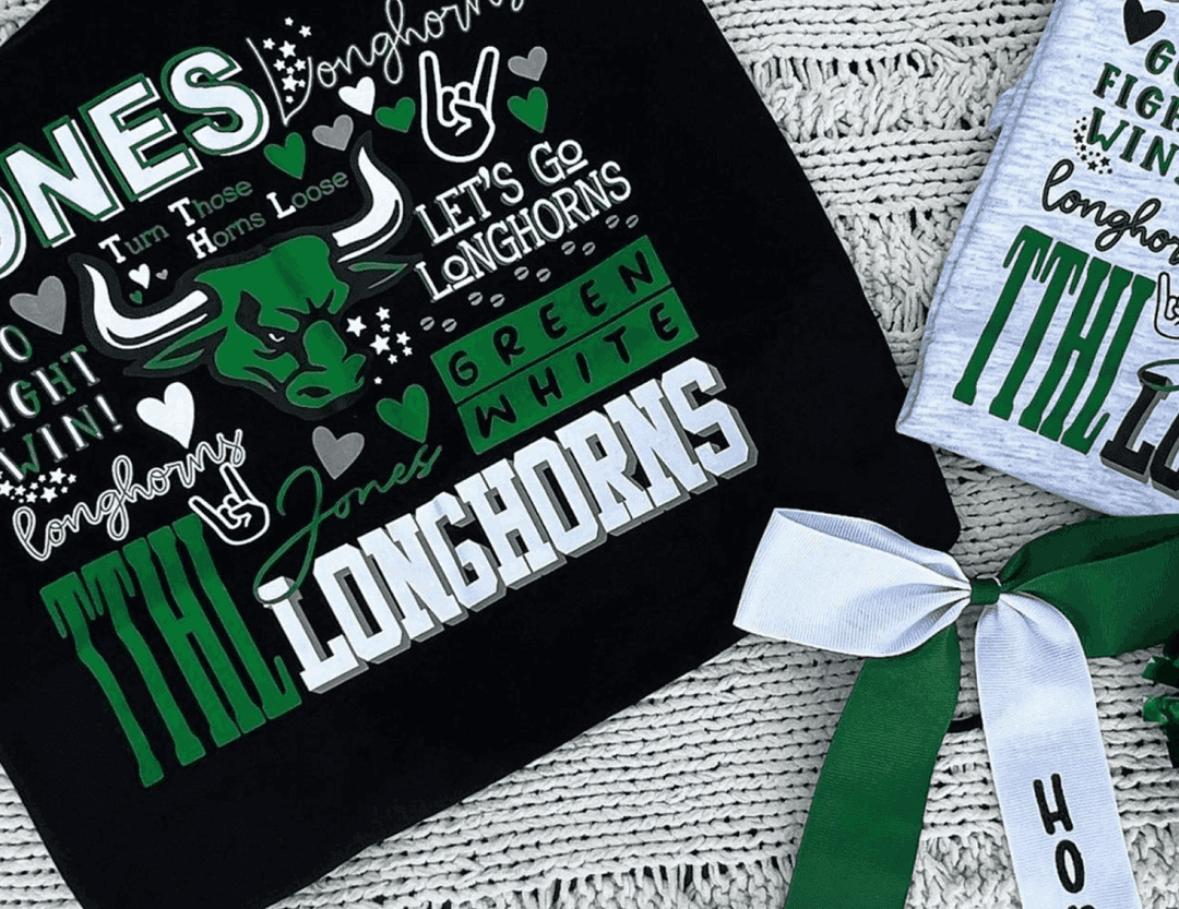Black and gray Longhorns-themed apparel with ribbon.
